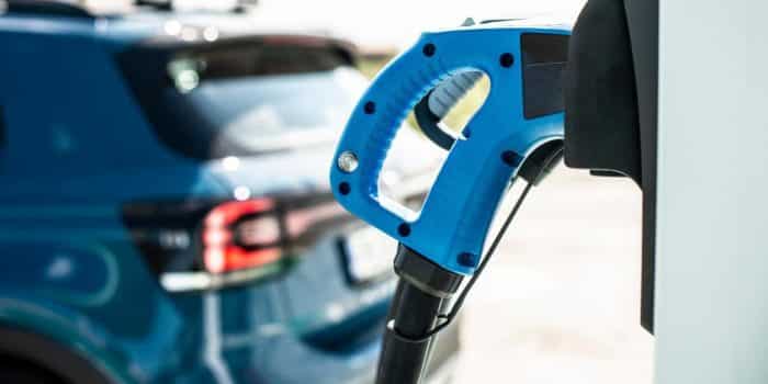 Used hybrid cars refueling, illustrating the advantages of a hybrid car: lower fuel consumption